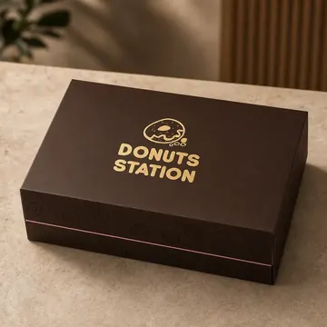علبة تغليف 6 دونات Packaging for DONUTS STATION - AI-generated packaging design concept